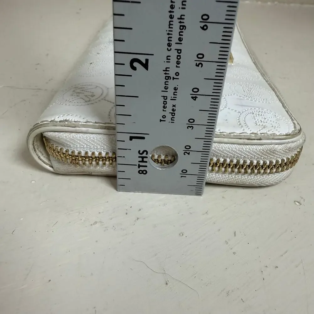 Michael Kors Contential MK Mono Mirror White Metallic zip around long wallet